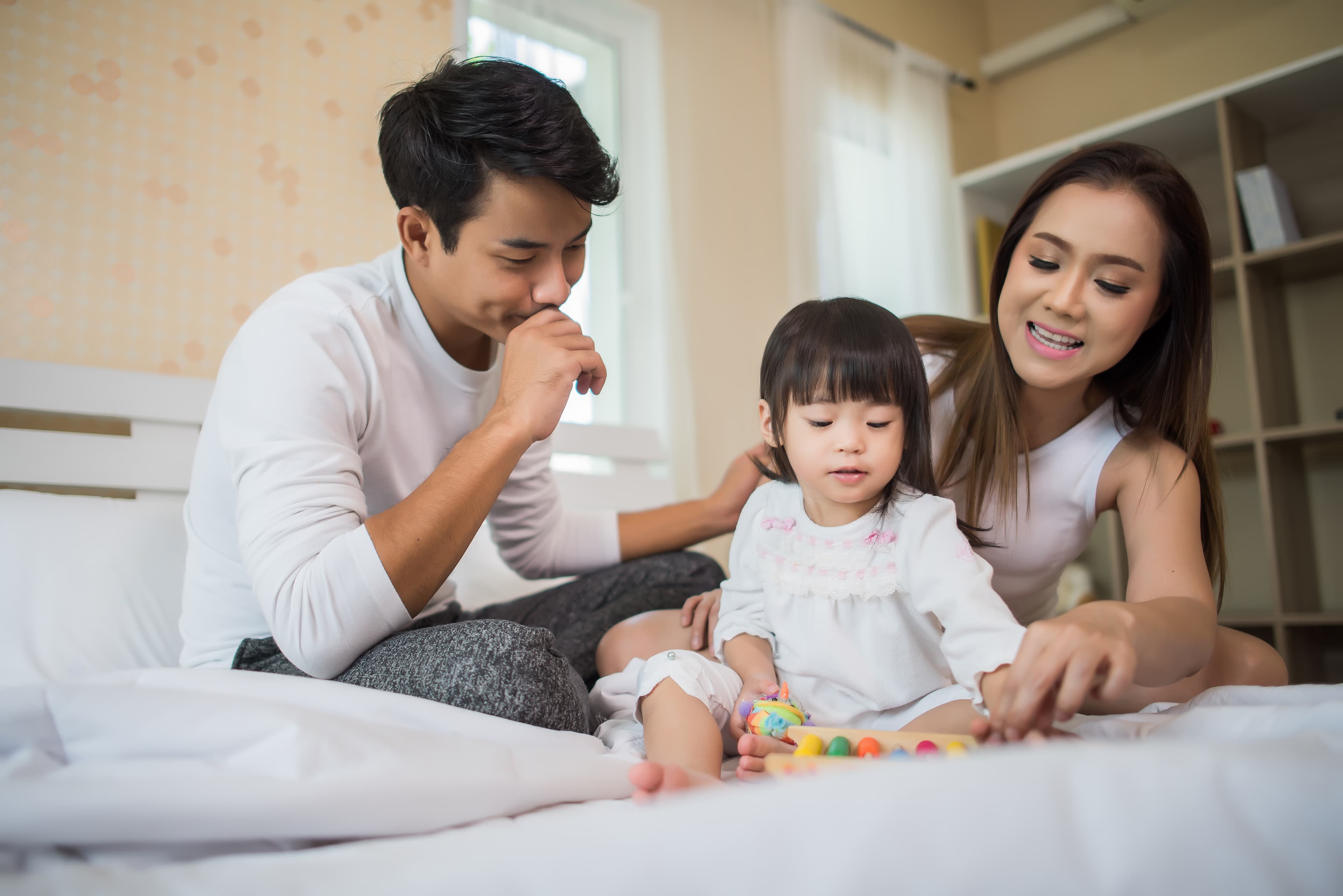 Child with parents, a family built with Angel Fertility